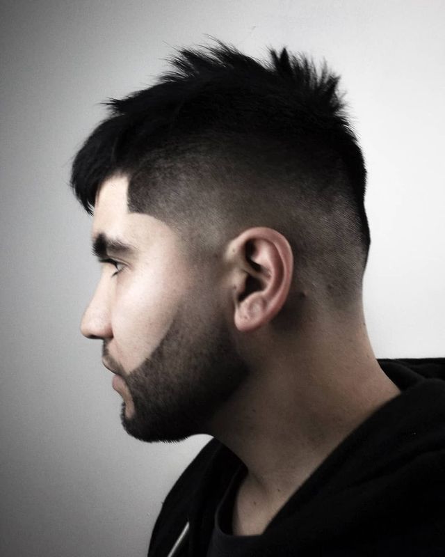 High skin fade with spiky textured top